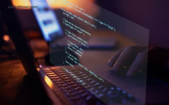 Featured image showcasing AI Vibe Coding: A futuristic workspace illustrating collaboration between AI and humans in software development, with dynamic elements like code snippets and chatbots, highlighting the accessibility and innovation in the coding process.